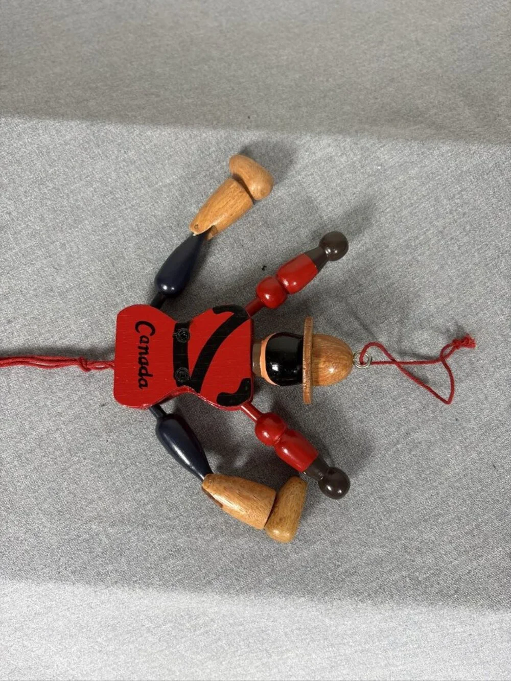 Wooden RCYMP Mountie Royal Canadian Mounted Police Jumping Jack Toy